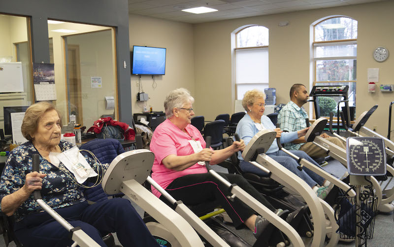 Rehab patients using exercise machines.